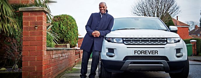 A happy Forever Business Owner with his car